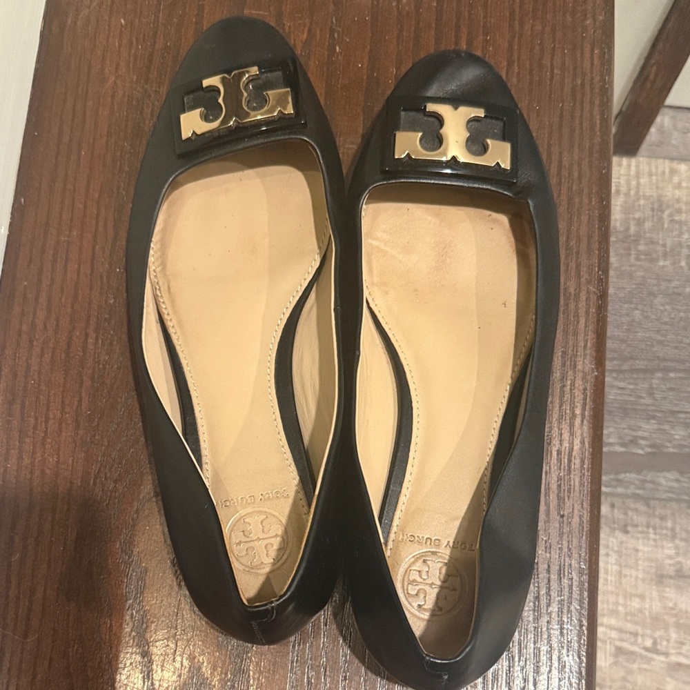 Tory Burch Black Flats with Gold Emblem
